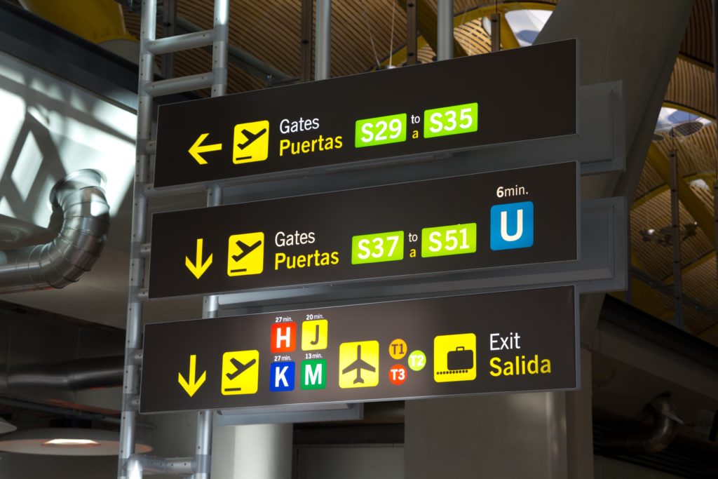 Airport signs in Spanish and English